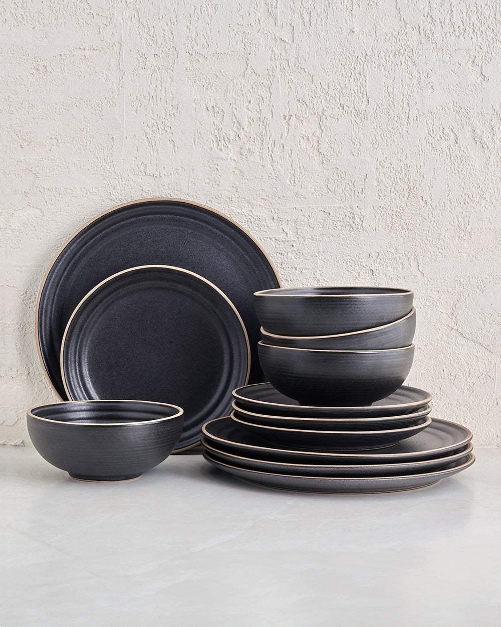 Charcoal stoneware dinnerware set with plates and bowls, minimalist modern design