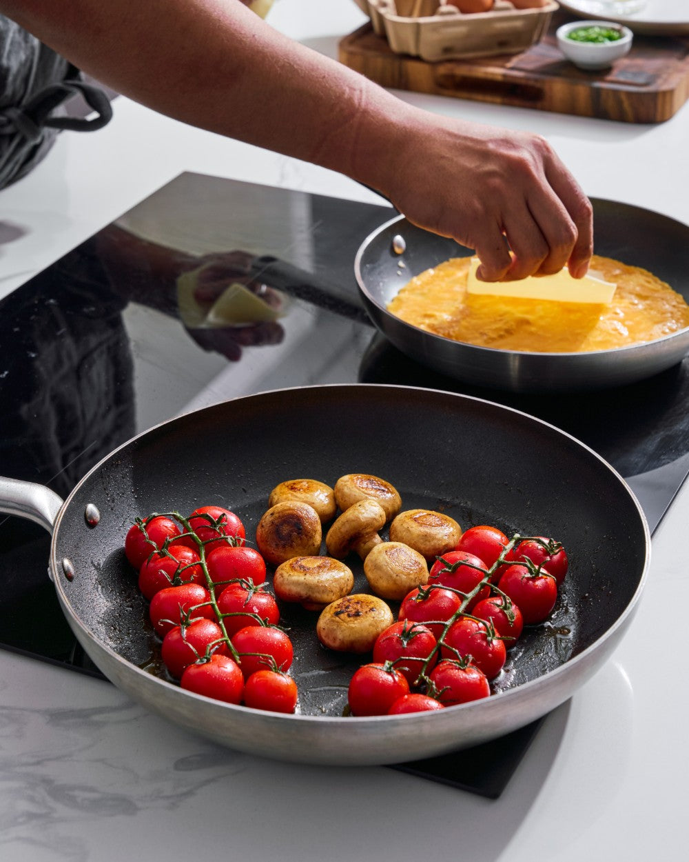 ALL COOKTOPS 5-ply Mako pans in use for breakfast CookDineHost