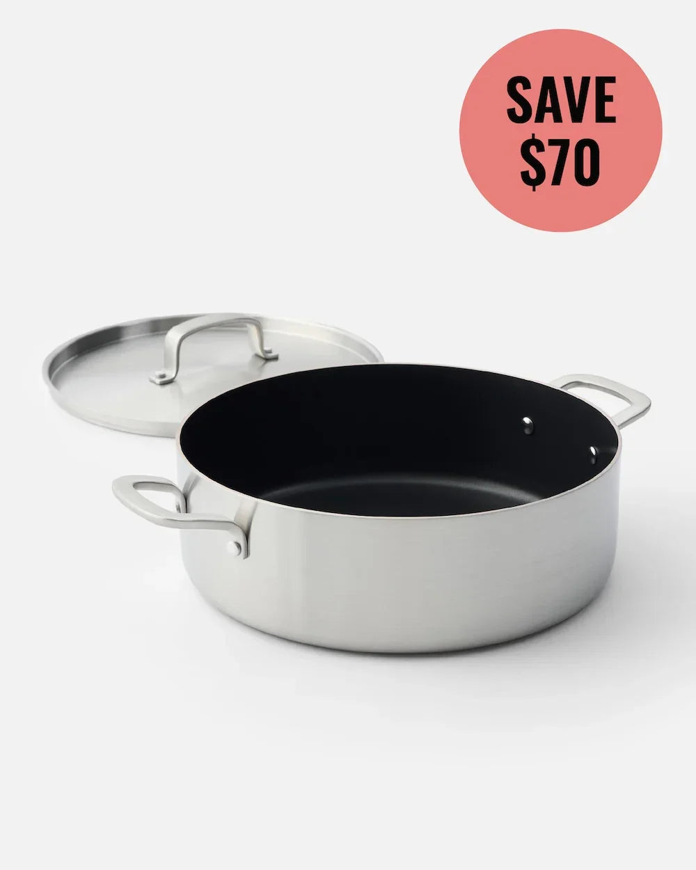 Stainless steel pot with black nonstick interior and lid off to the side, save $70 offer