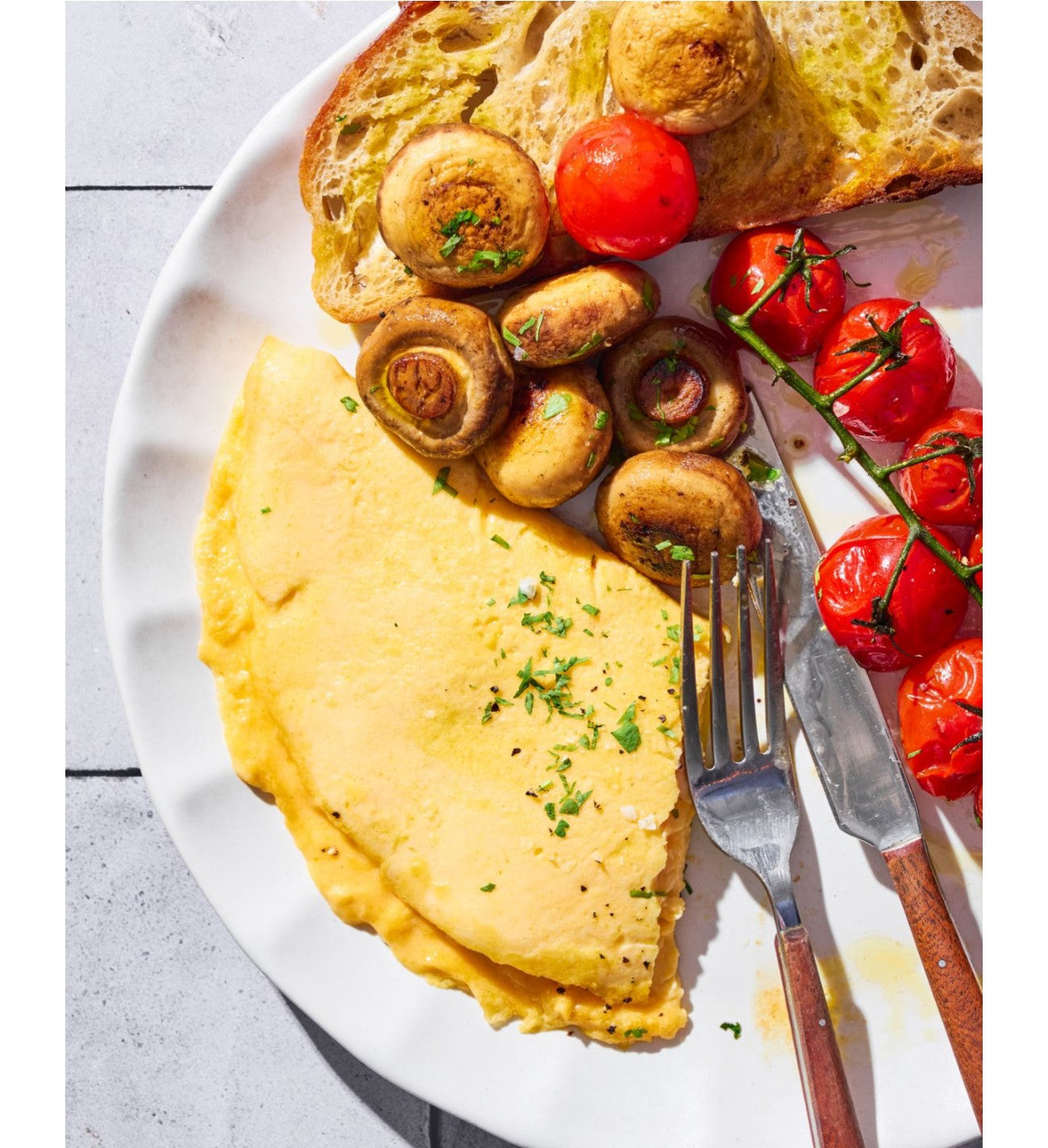Creamy Mushroom & Tomato Omelette hero image CookDineHost
