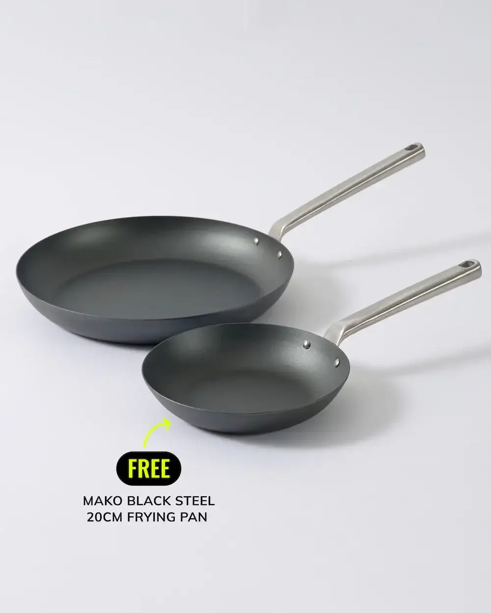 Two black steel frying pans with metal handles on white background, 20cm pan labeled as free.
