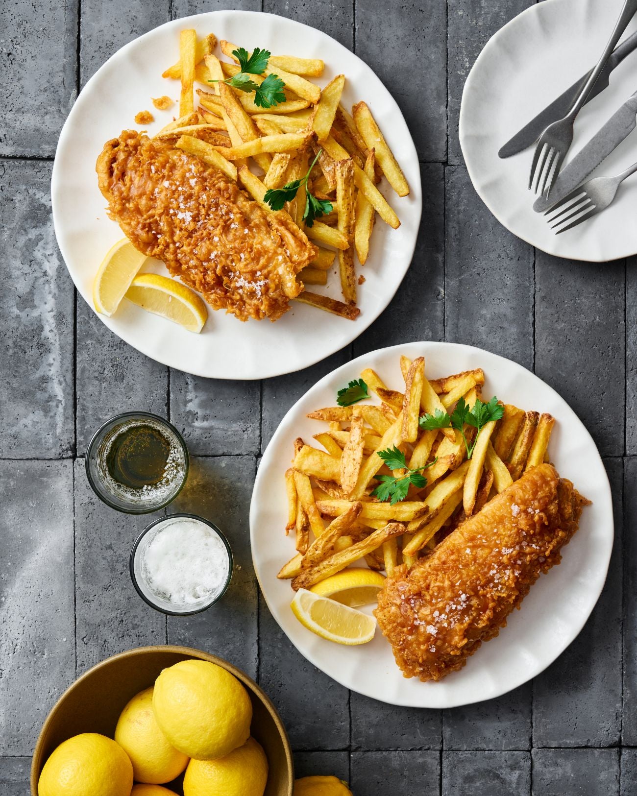 Beer-Battered Fish and Chips flay lay on grey benchtop