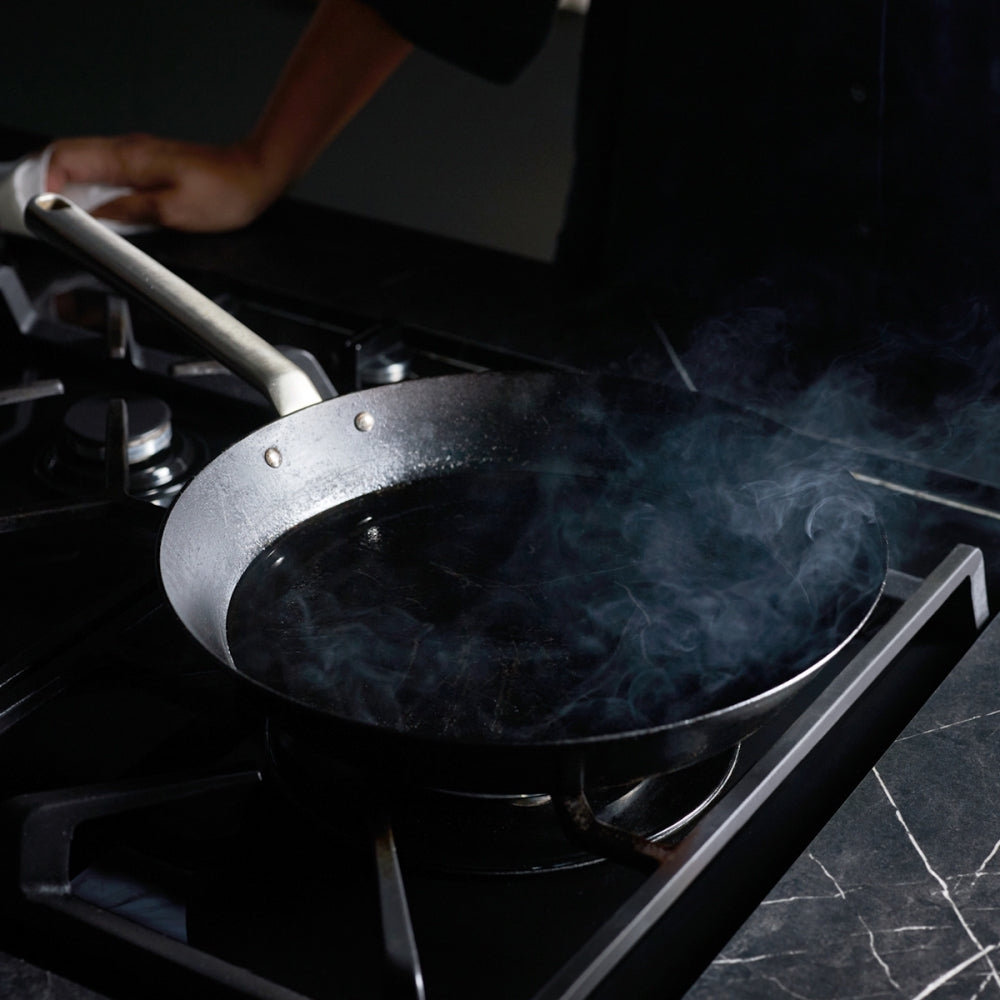 Step 3 - Heat your pan on your cooktop on a medium heat until you see light smoke appear.