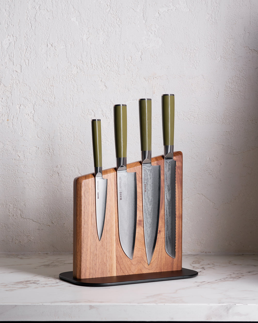 MAKO Magnetic Knife Block with green handle knives on marble bench top