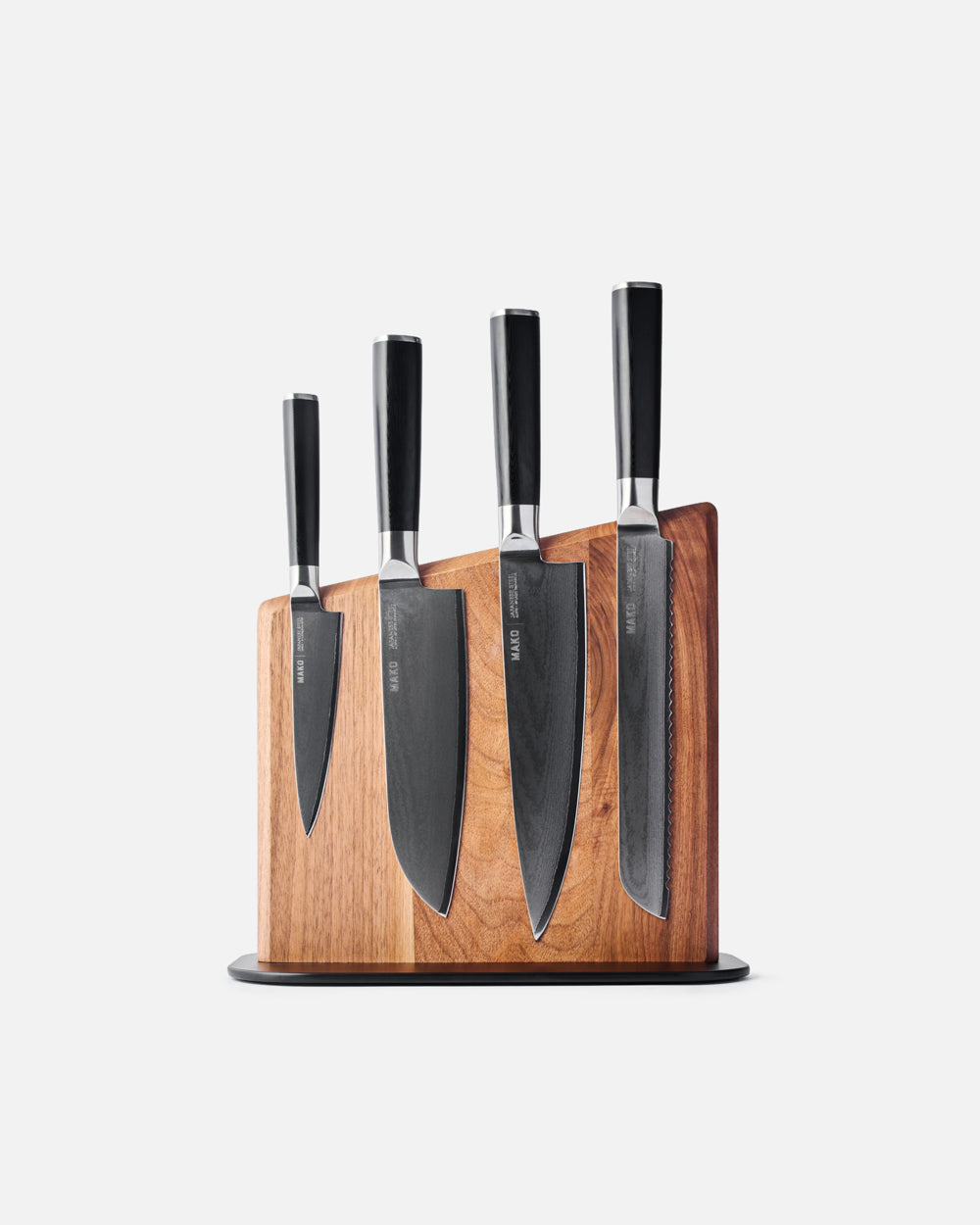 MAKO Magnetic Knife Block with knives stuck to the block with black handles white background side angle