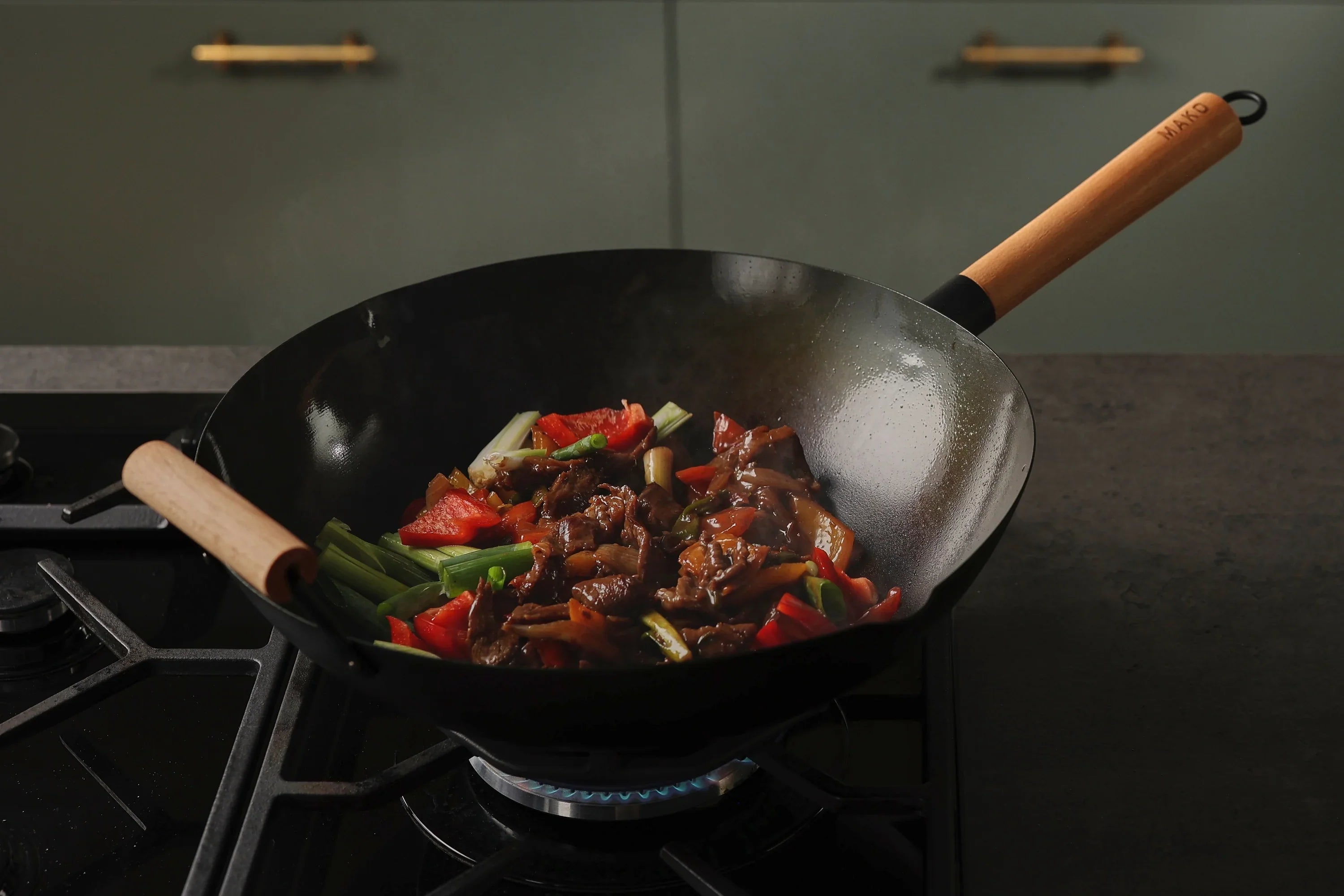 The MAKO Black Steel 14 Wok is crafted using pre-seasoned black carbon steel for ultimate performance.
