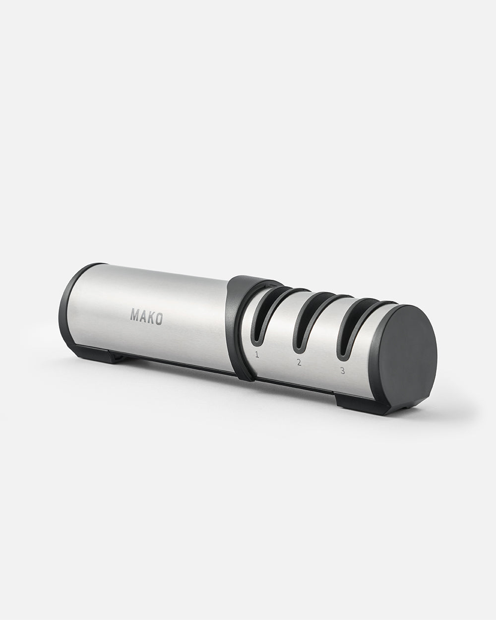 Stainless steel three-stage MAKO knife sharpener on a plain white background