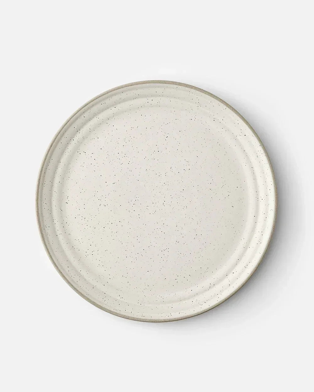 Minimalist white speckled ceramic dinner plate with matte rim by Marion Grasby