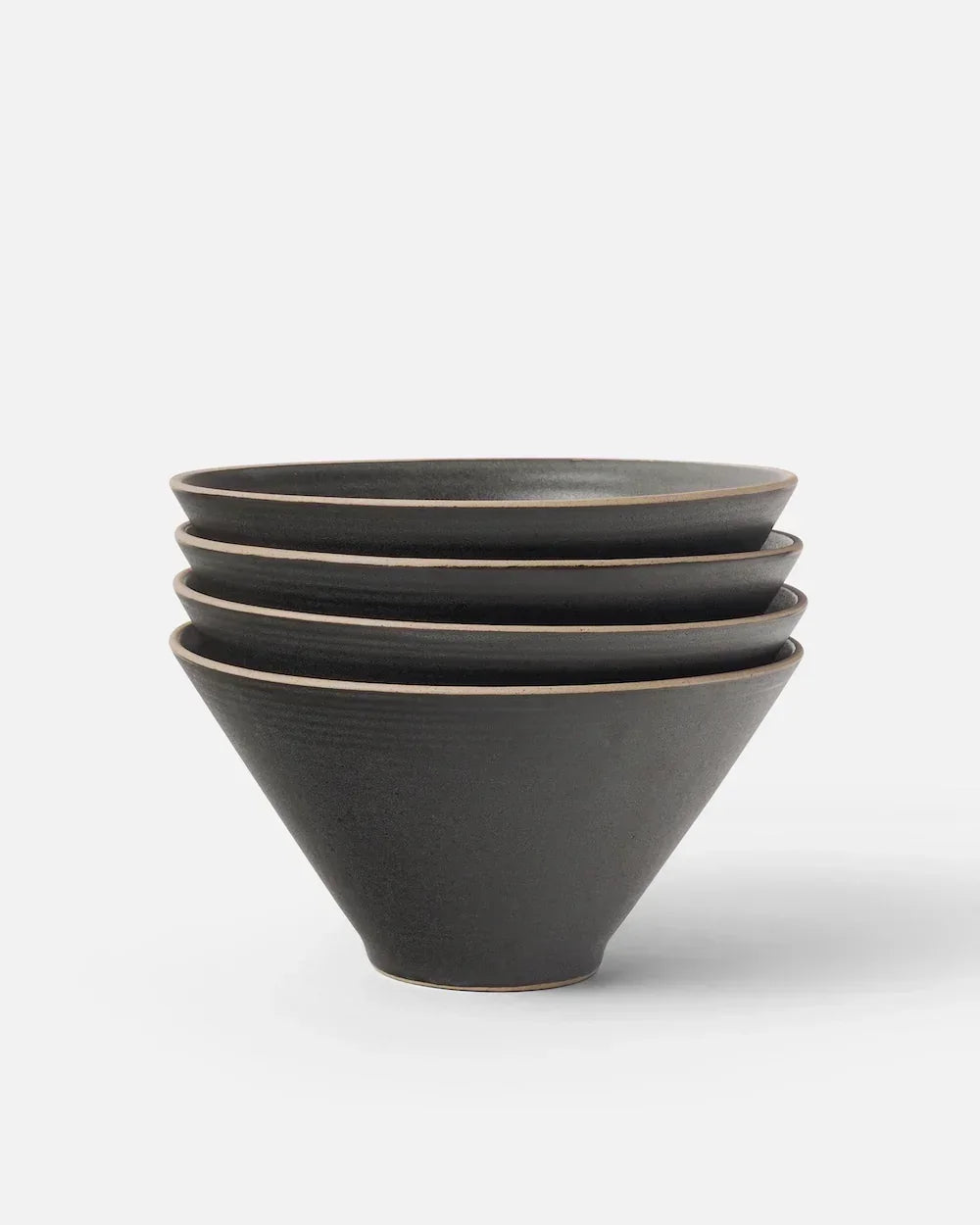 Stack of four charcoal black Asoke noodle bowls with a matte finish by Marion Grasby