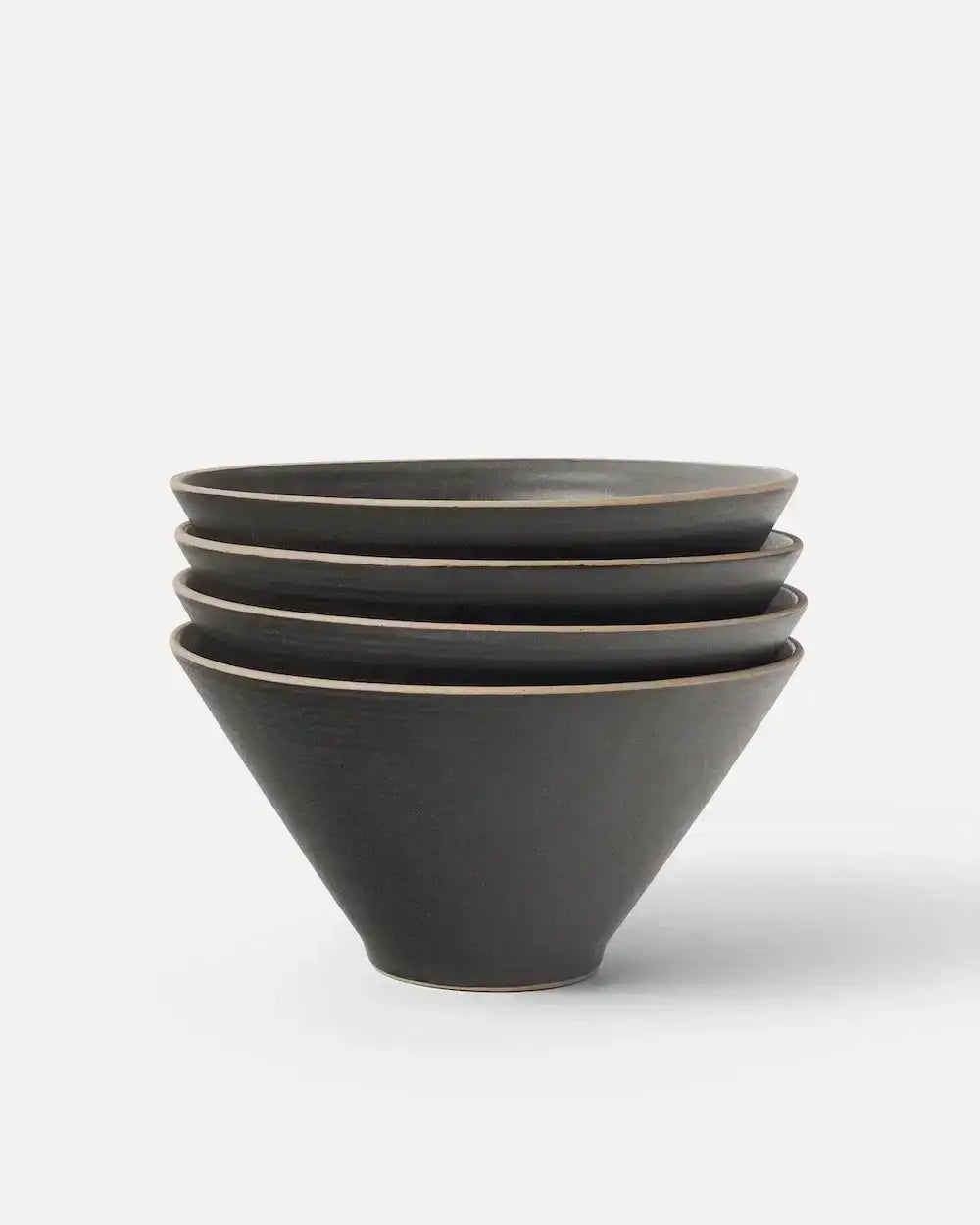Stacked Asoke charcoal ceramic noodle bowls by Marion Grasby on white background