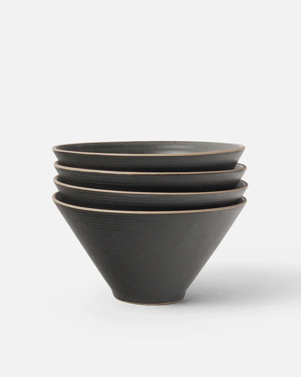 Stacked Asoke charcoal ceramic noodle bowls by Marion Grasby on white background