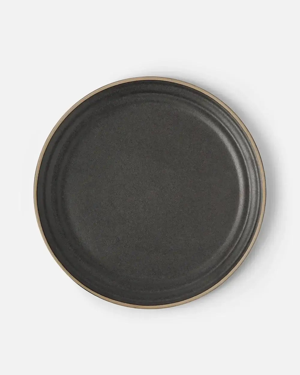 Asoke charcoal dinner plate with textured dark surface and light beige rim by celebrity chef Marion Grasby