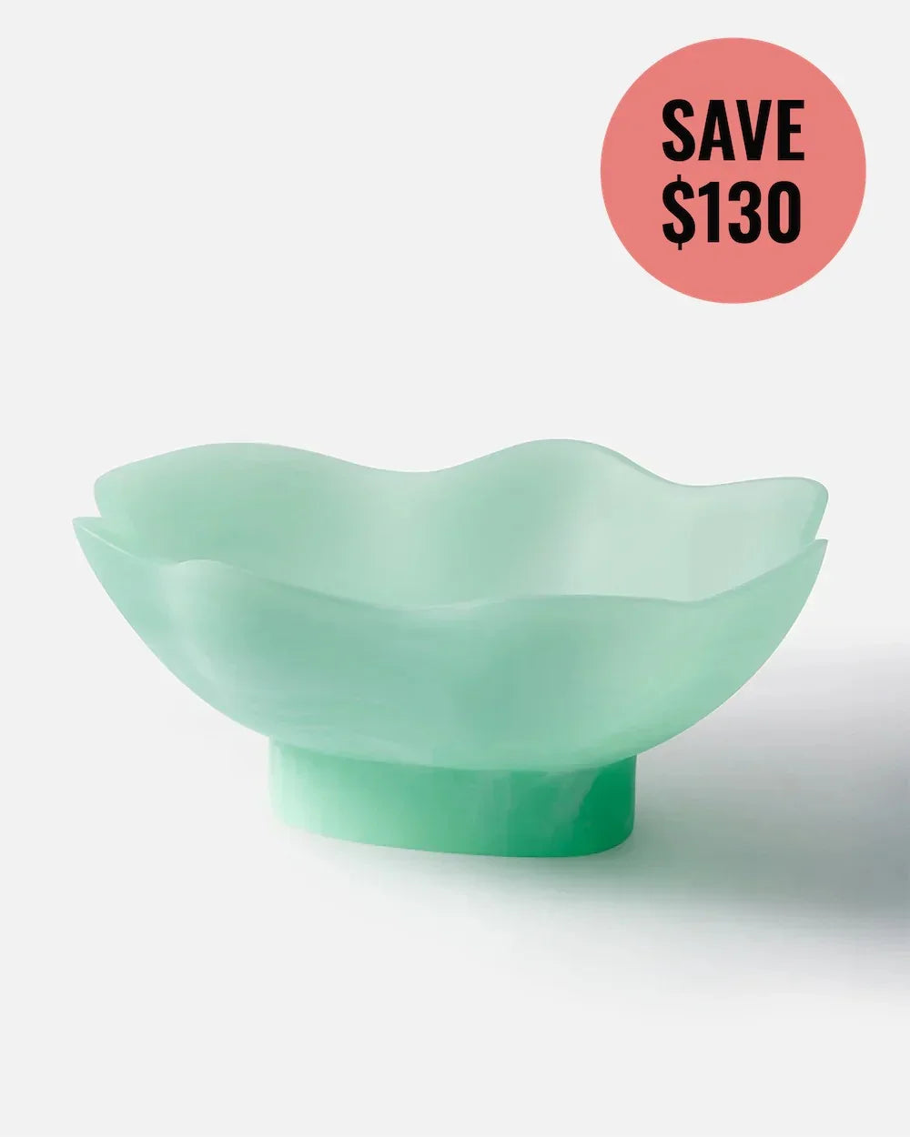 Mint green footed bowl with wavy edges, promoting $130 savings, designed by Marion Grasby