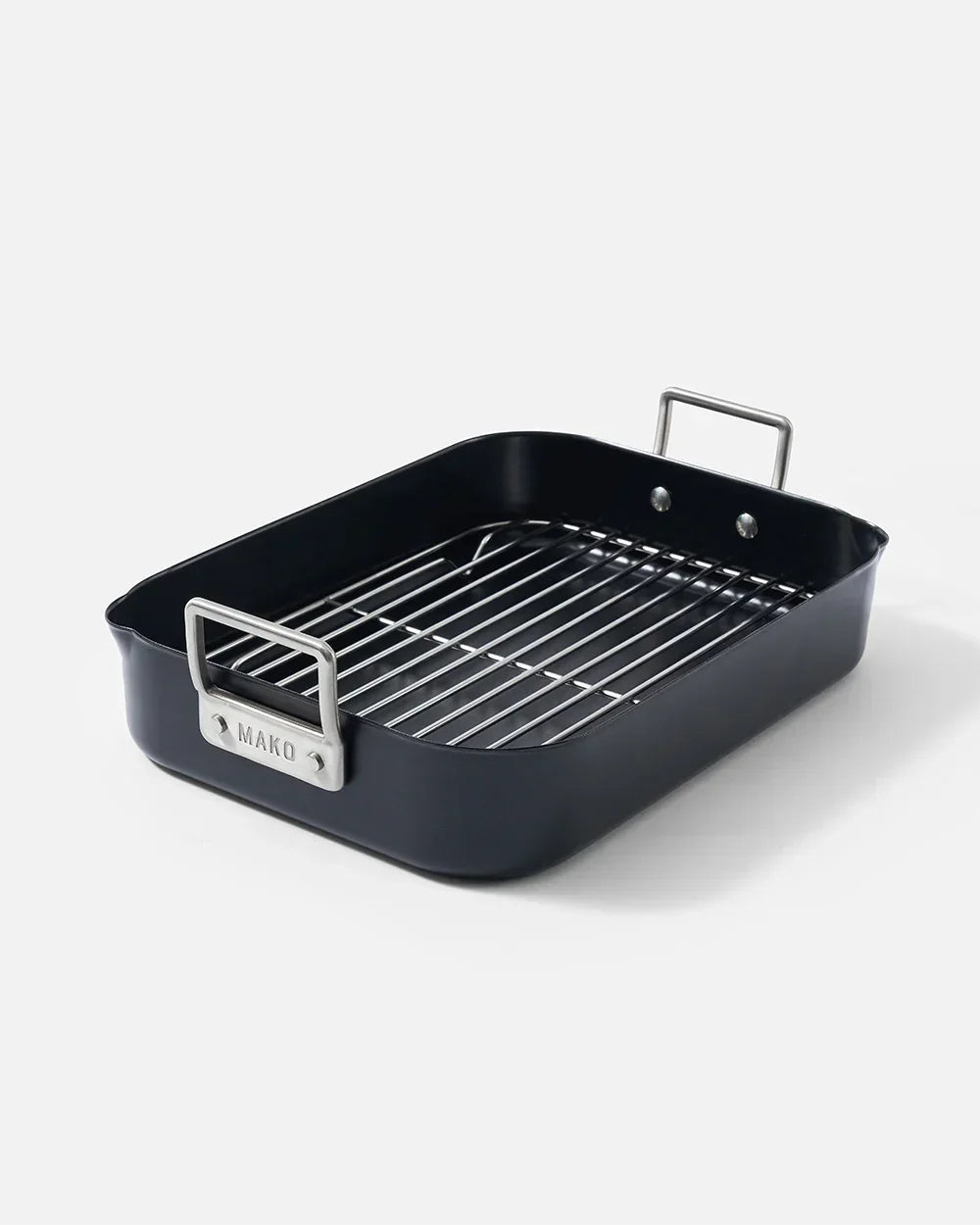 Black roasting pan with stainless steel handles and removable grill rack on white background