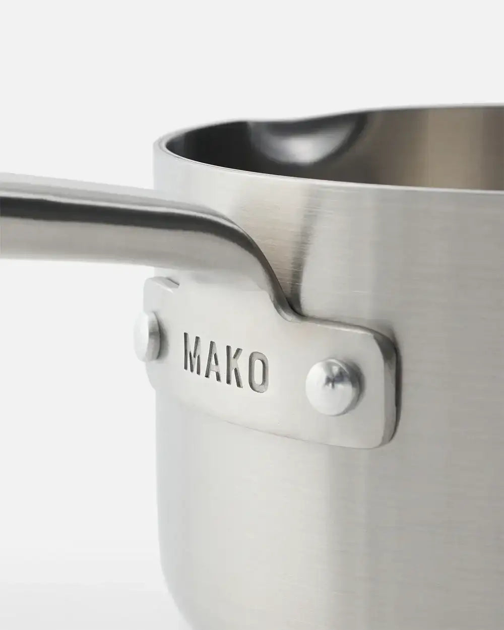 Close-up of stainless steel Mako saucepan handle, premium cookware by Marion Grasby