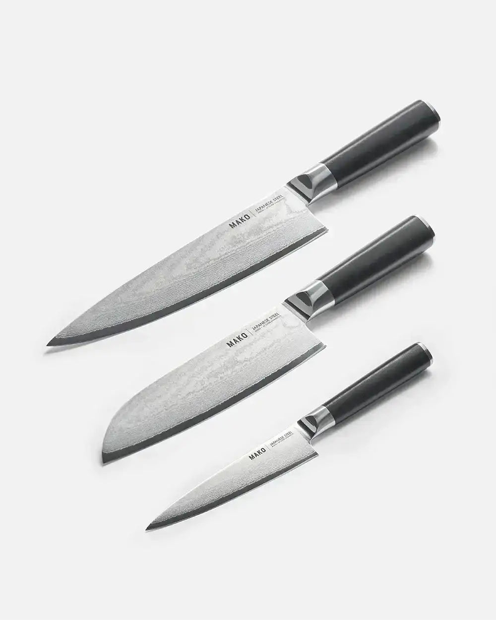Mako chef knife set with three Japanese steel blades and black handles by Marion Grasby