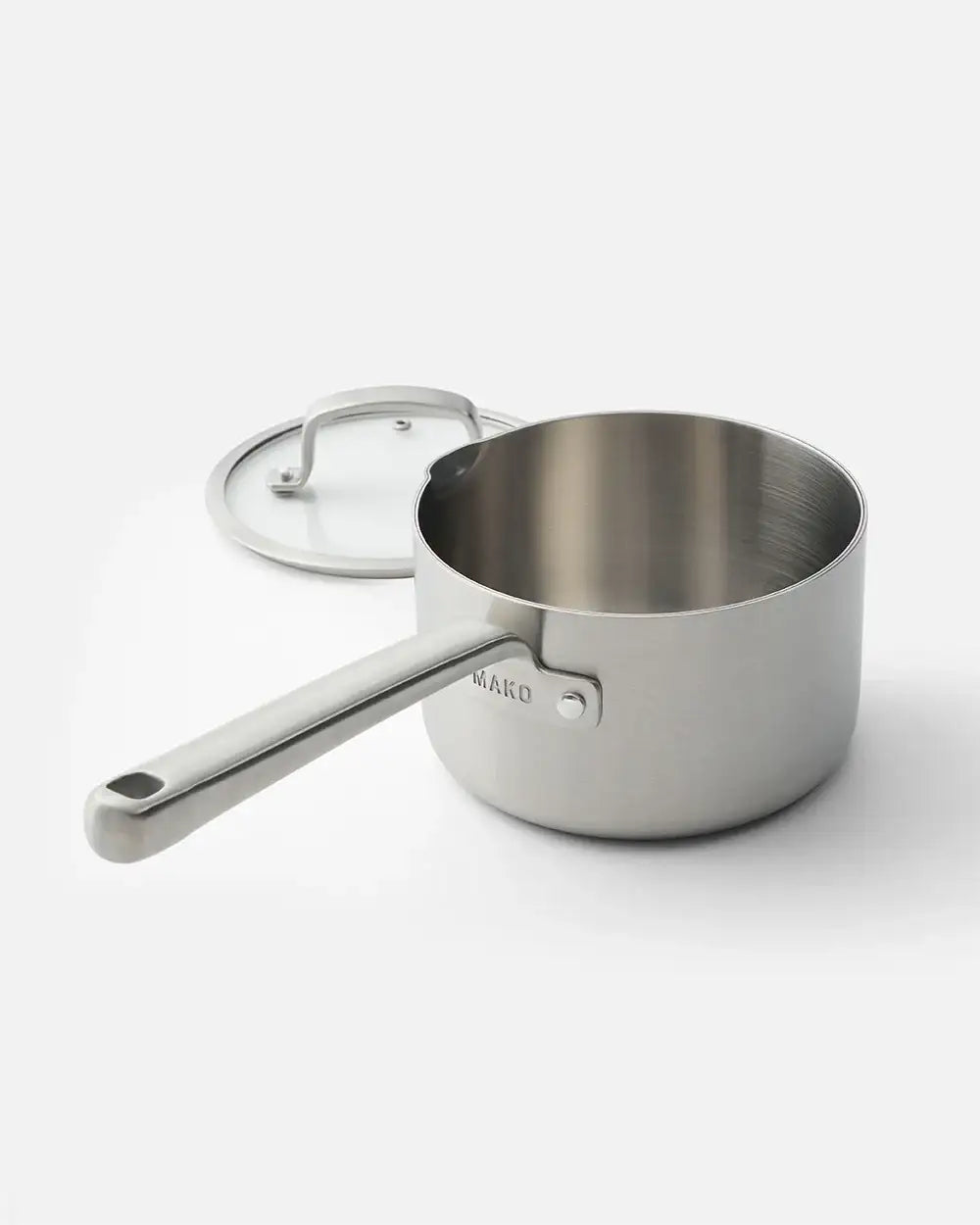 Stainless steel Mako saucepan with long handle and glass lid, modern kitchen cookware by Marion Grasby