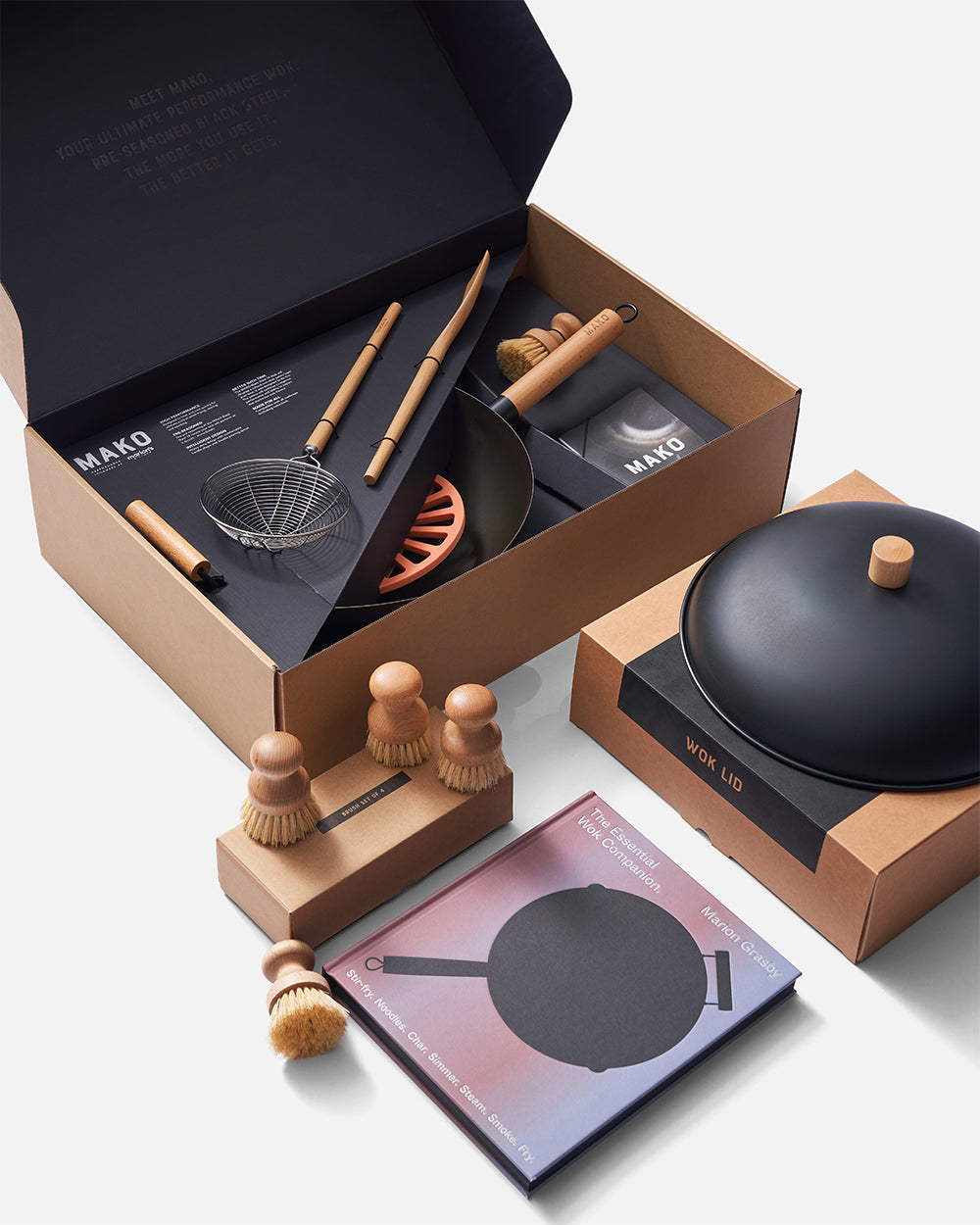 MAKO Black Steel 14 Wok Essentials Set flat lay on white background side angle