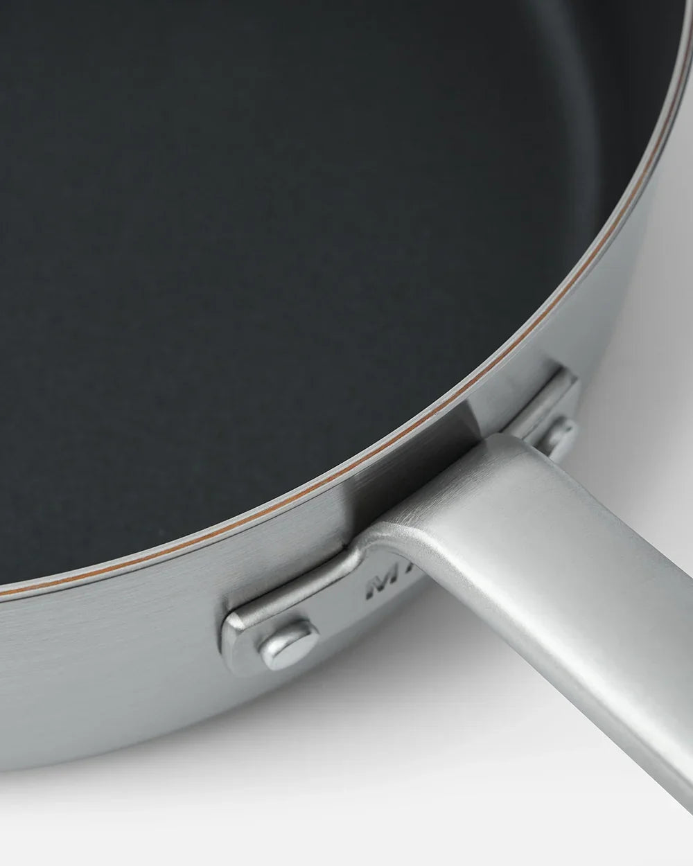 Close-up of Mako non-stick saute pan with stainless steel handle by Marion Grasby