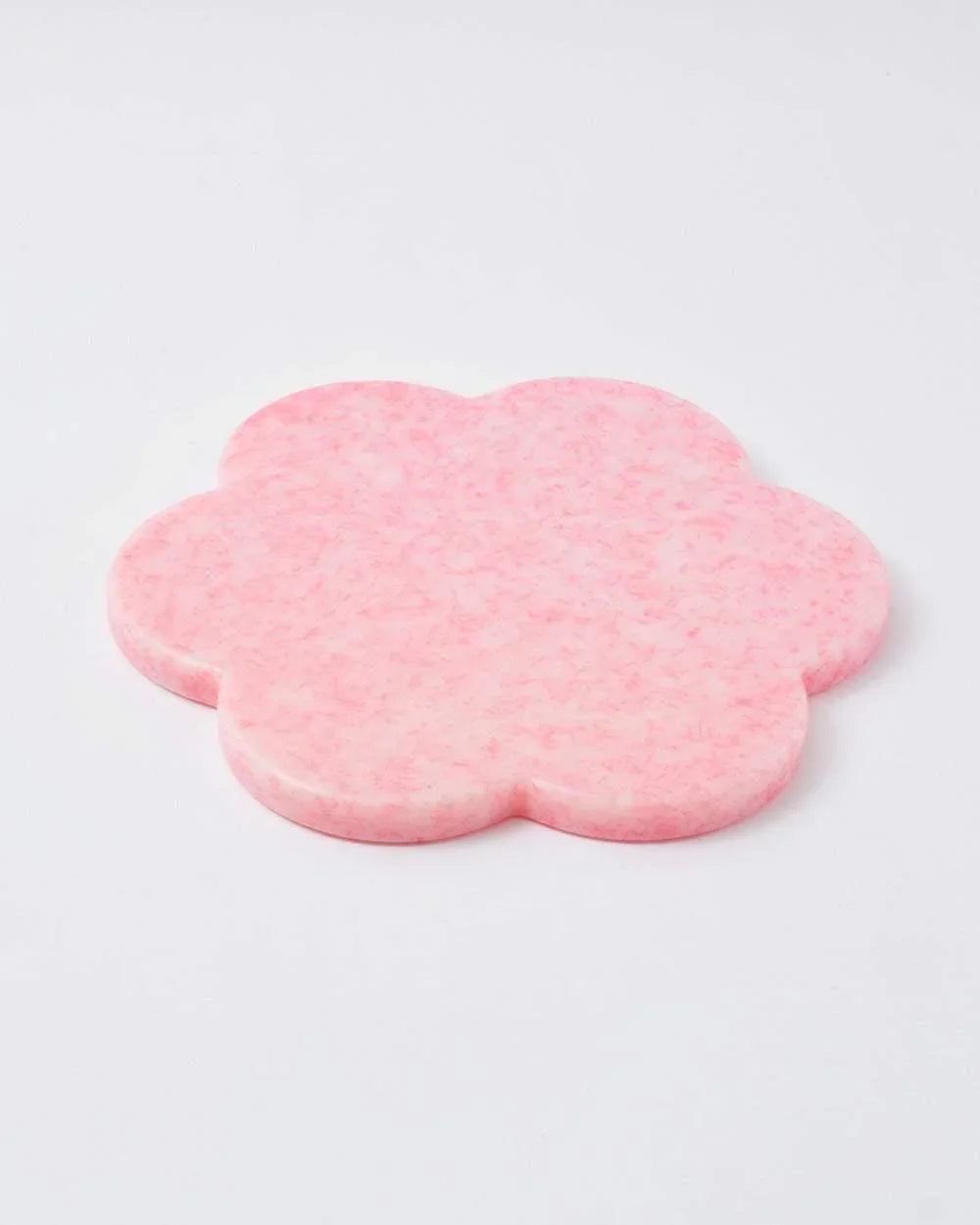 Pink flower-shaped recycled chopping board from Marion Grasby's Asoke collection on white background
