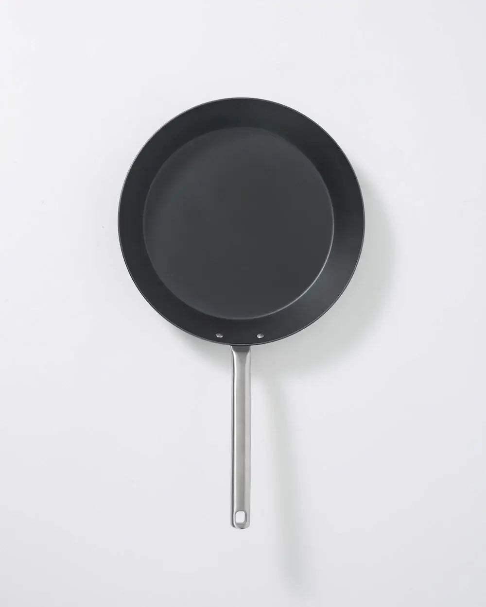 MAKO Black Steel Steak Pan - CookDineHost flat lay on white background