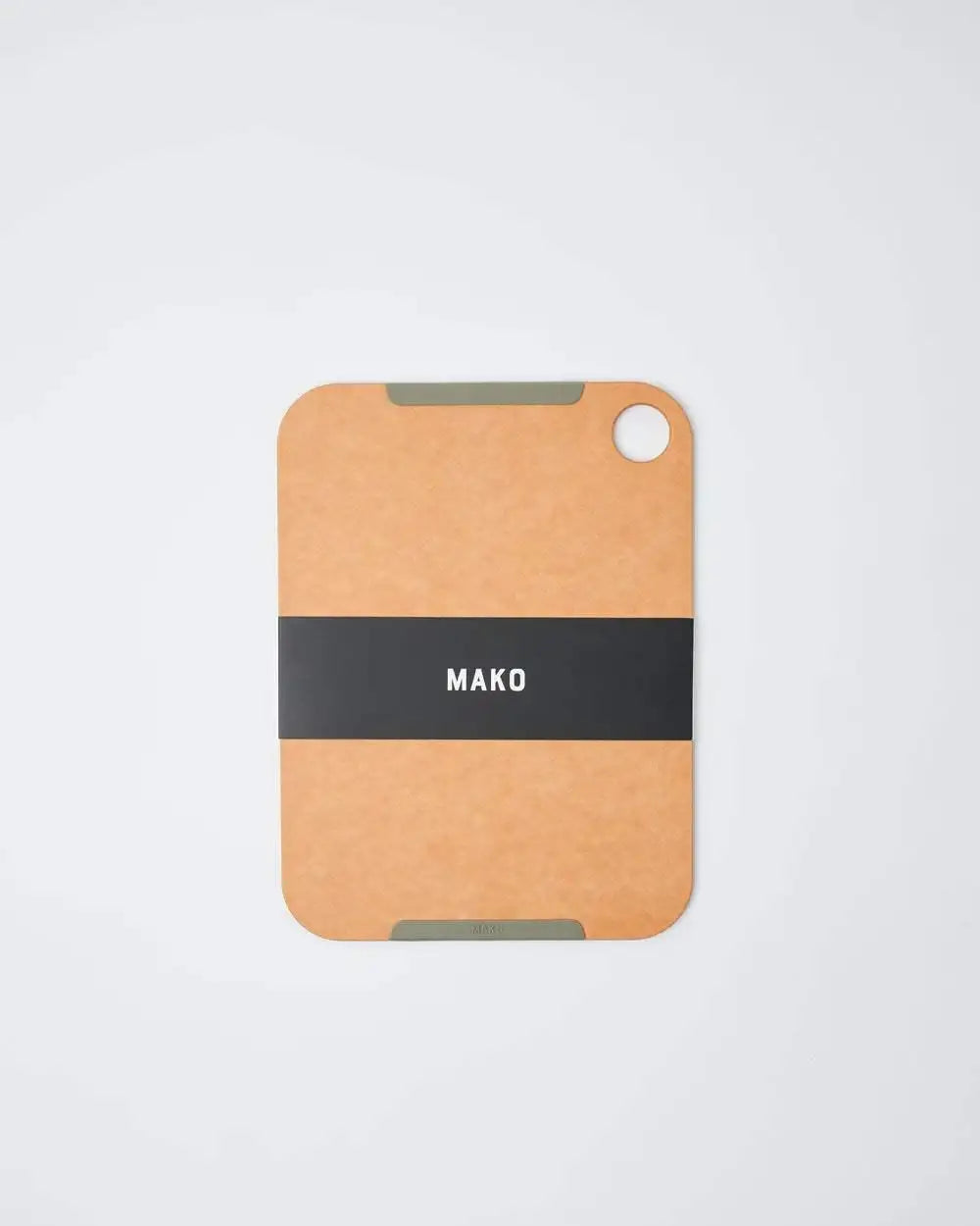 Mako large non-slip wood fibre chopping board with hole and black label, by Marion Grasby