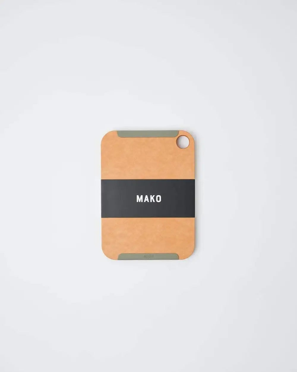 Small Mako non-slip wood fibre chopping board with gray corner grips and round hole