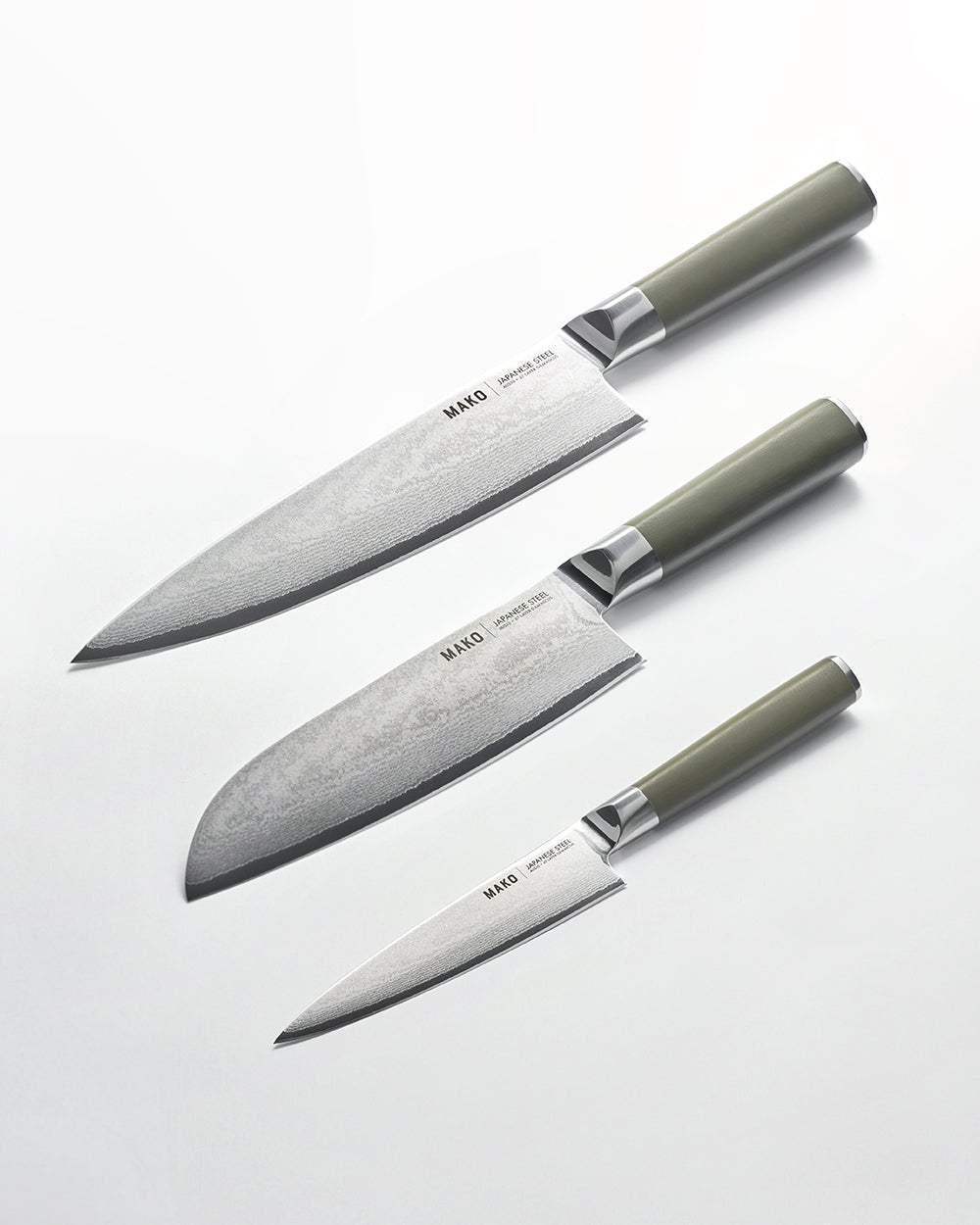 Mako Japanese steel knife set with olive green handles, designed by Marion Grasby, displayed on white background