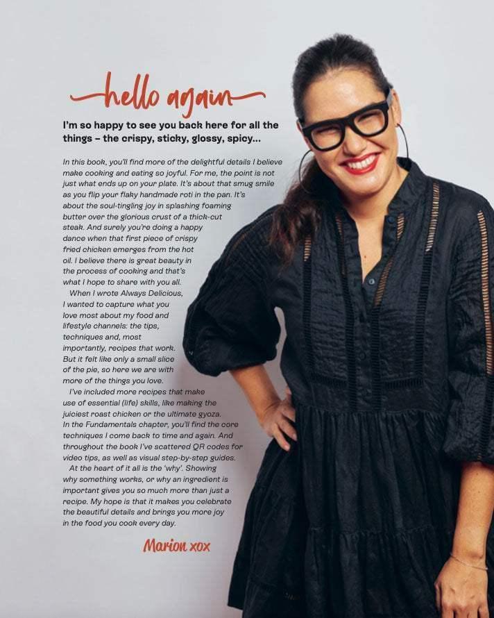 Woman in black dress and glasses smiling next to cookbook introduction text on white background