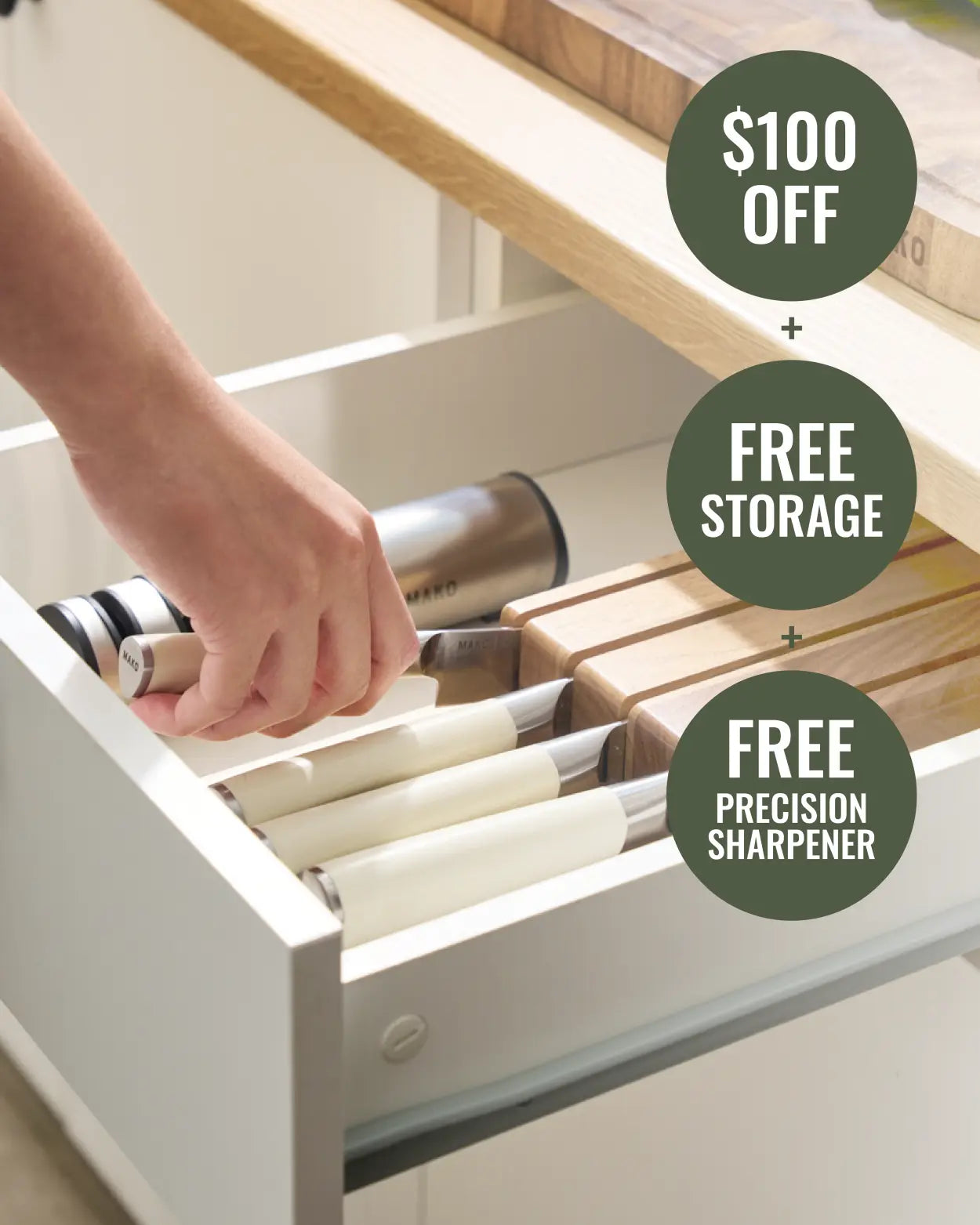 MAKO Japanese Steel Knife Set of 4 - Cream In Drawer lock holder hand reaching into rawer and pulling out utility knife