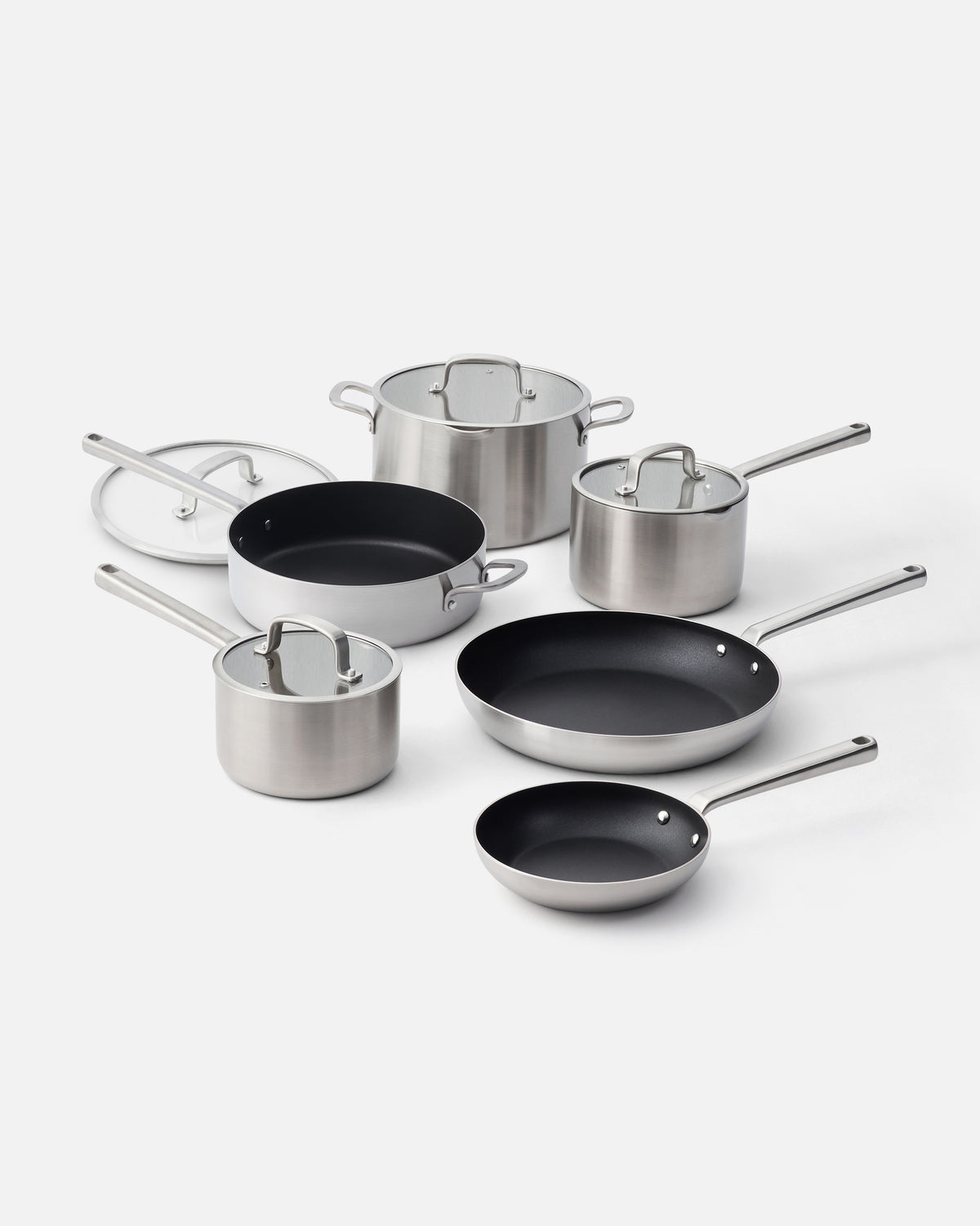 MAKO Signature Set 6 piece pans on white background diagonal angle Stainless steel 5ply cookware Non-Stick