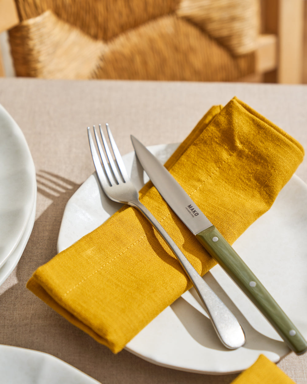 MAKO Steak Knife Set of 6 - Olive Green table setting yellow napkin and white plate with fork