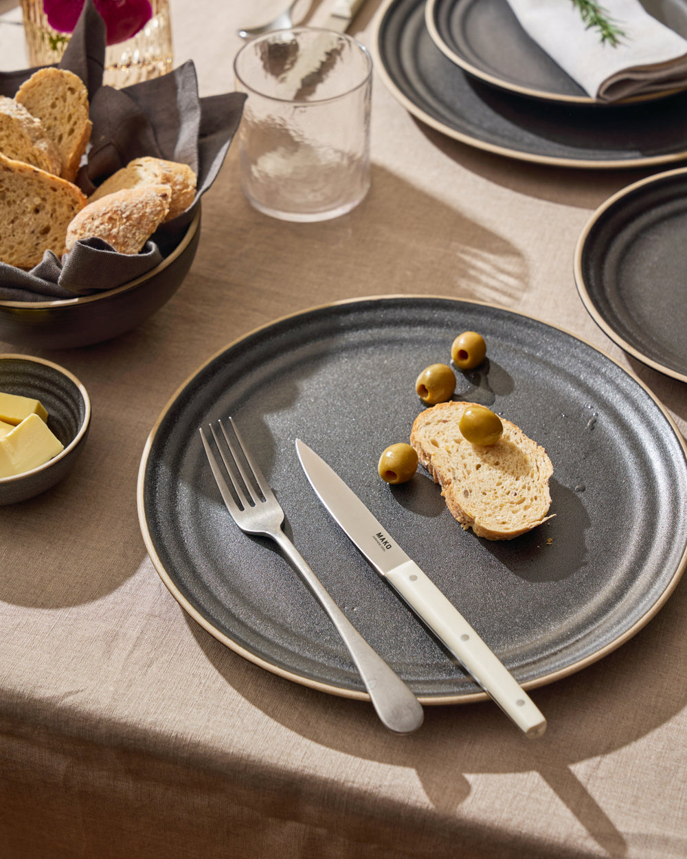 MAKO Steak Knife Set of 6 - Cream use situation on charcoal Anaya plates table setting bread butter and glasses
