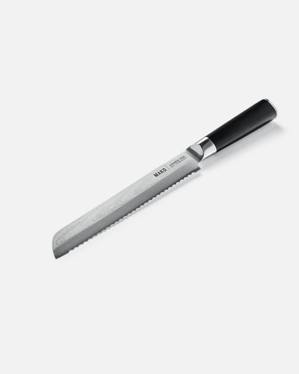 MAKO Japanese Steel Black 8″ Bread Knife white background diagonal angle CookDineHost