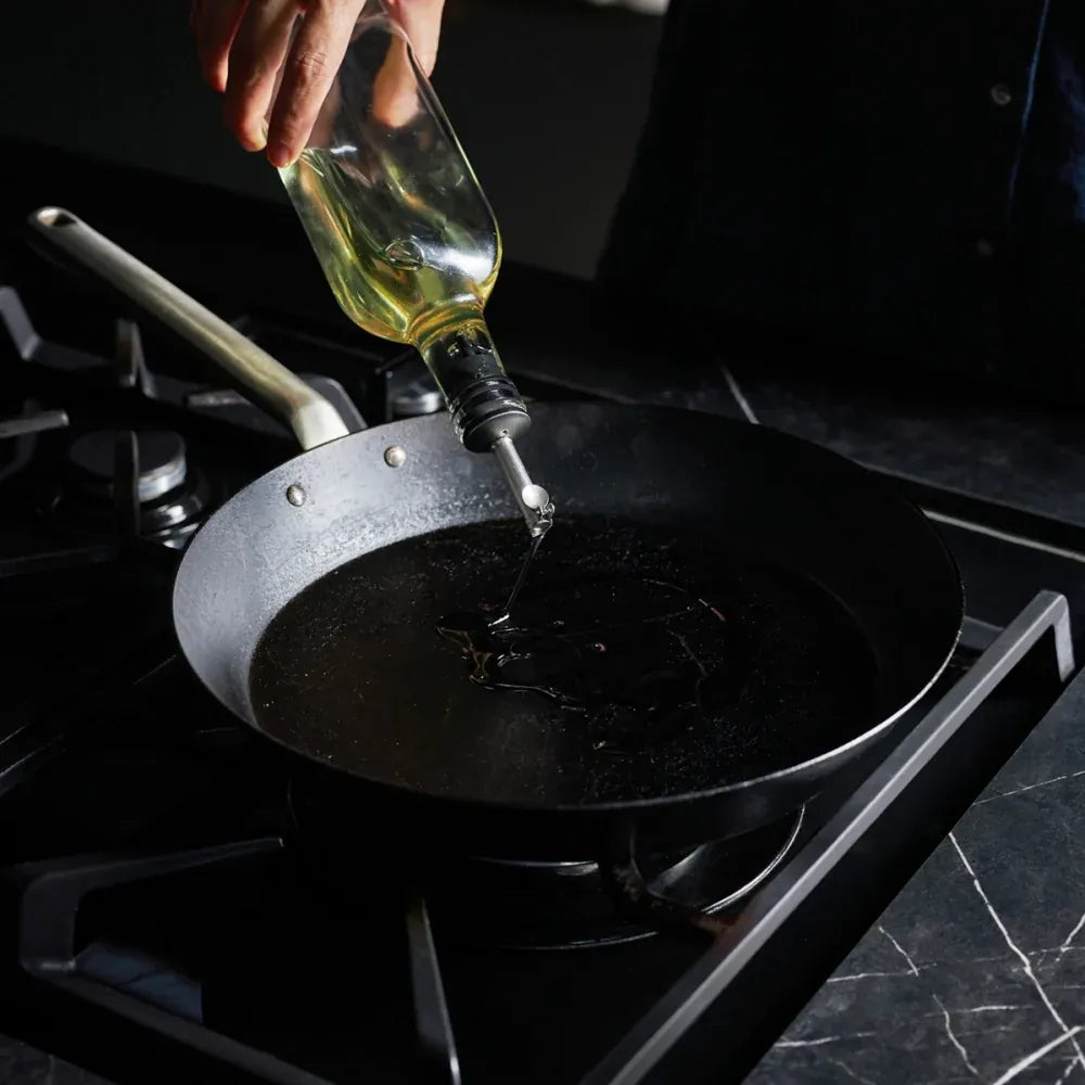 Step 4 - Add two teaspoons of vegetable oil to your hot pan. 