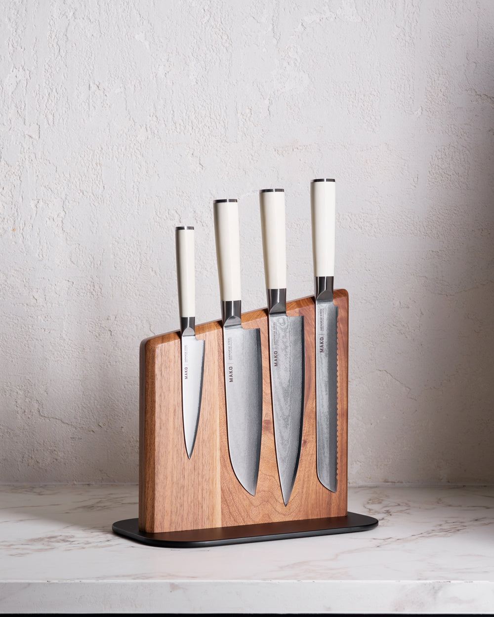 MAKO Japanese Steel Knife Set of 4 - Cream Magnetic Stand on white benchtop with shadows 
