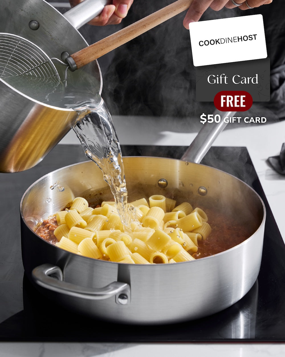 MAKO Genius 5-Ply 26cm Saute Pan With Lid pouring starch water into pasta on stovetop GIft Card promo 