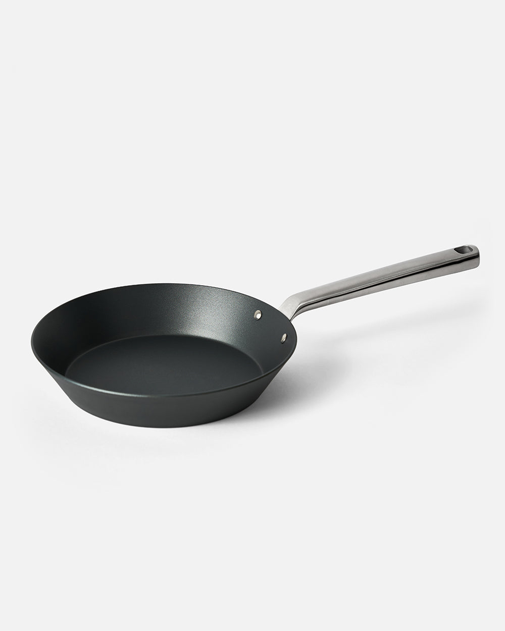 Nonstick frying pan with metal handle on white background, modern cookware design