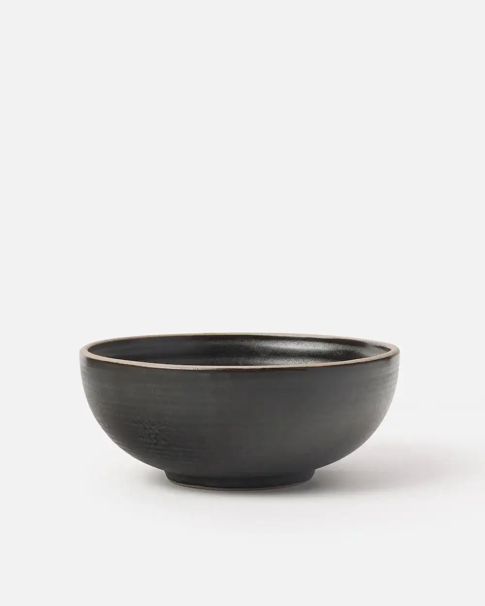 Asoke charcoal ceramic cereal bowl by Marion Grasby, matte black with simple rounded design