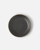 Charcoal ceramic side plate with a textured surface and natural rim by Marion Grasby's Asoke collection