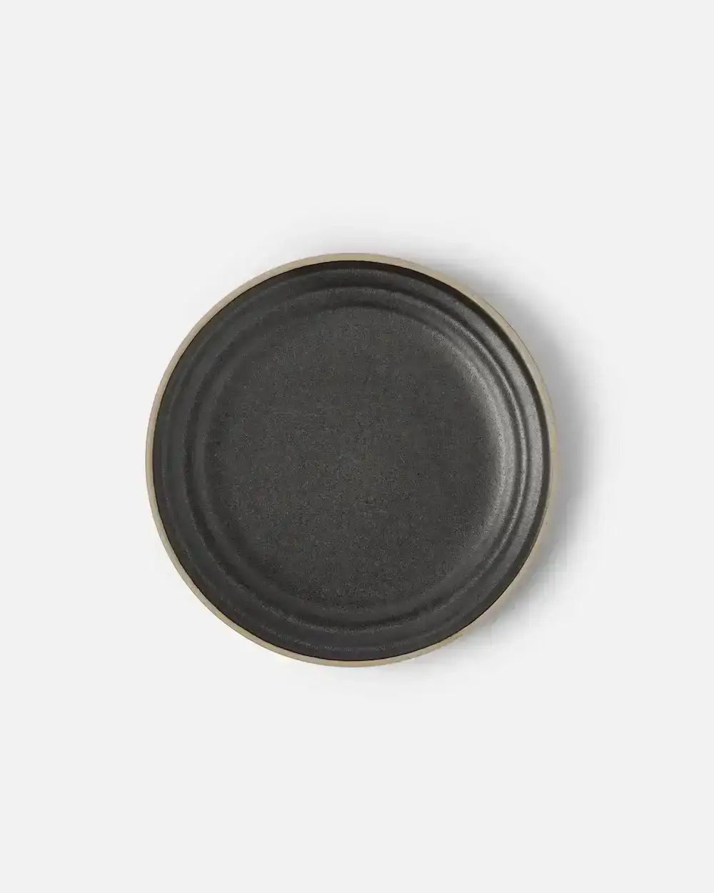 Asoke charcoal side plate by Marion Grasby, textured dark ceramic with natural rim detail