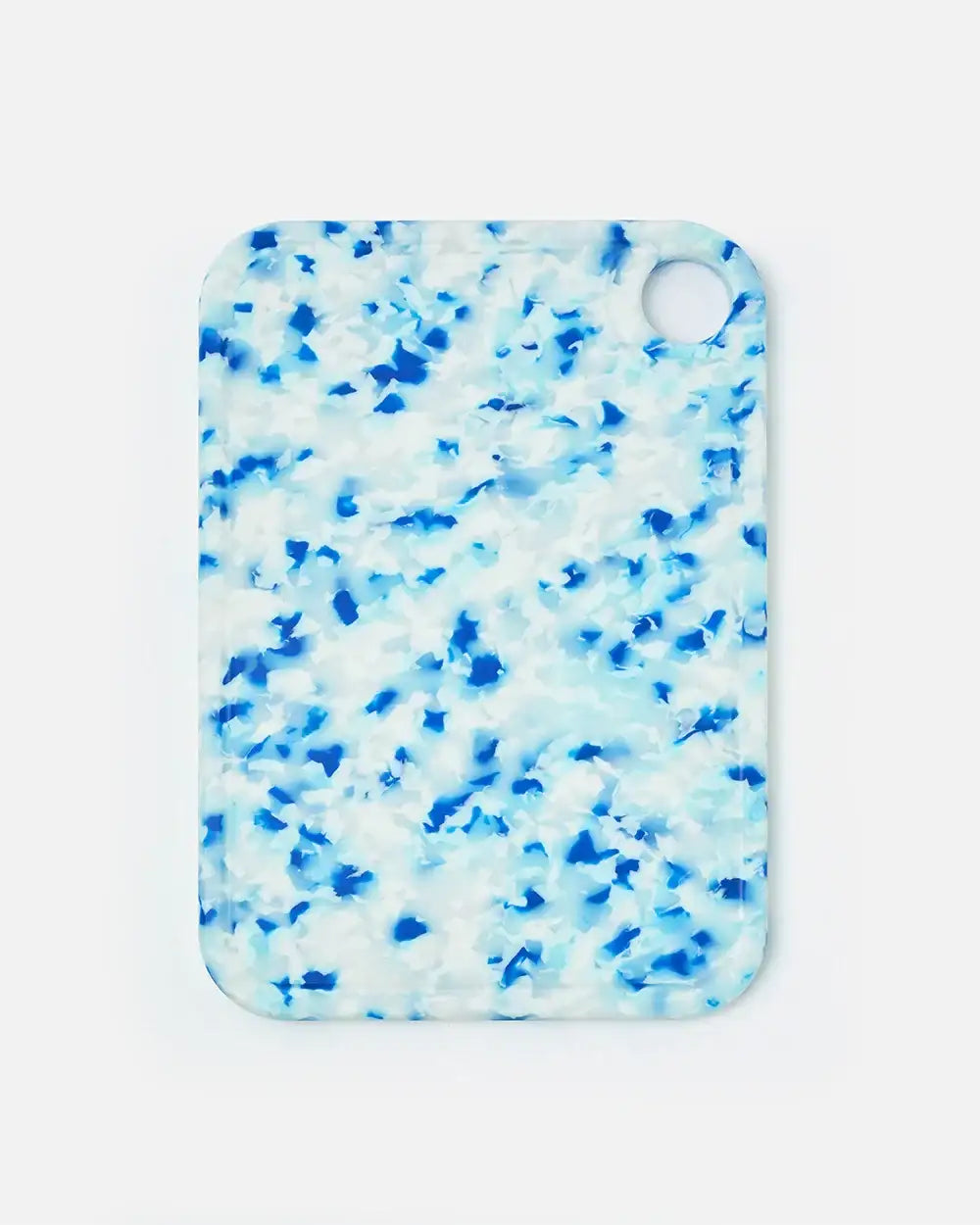 Marion Grasby Mako Asoke CookDineHost blue and white speckled cutting board with hole