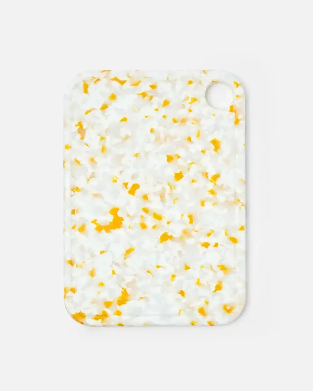 Marion Grasby Mako Asoke CookDineHost terrazzo chopping board with orange yellow and white speckles
