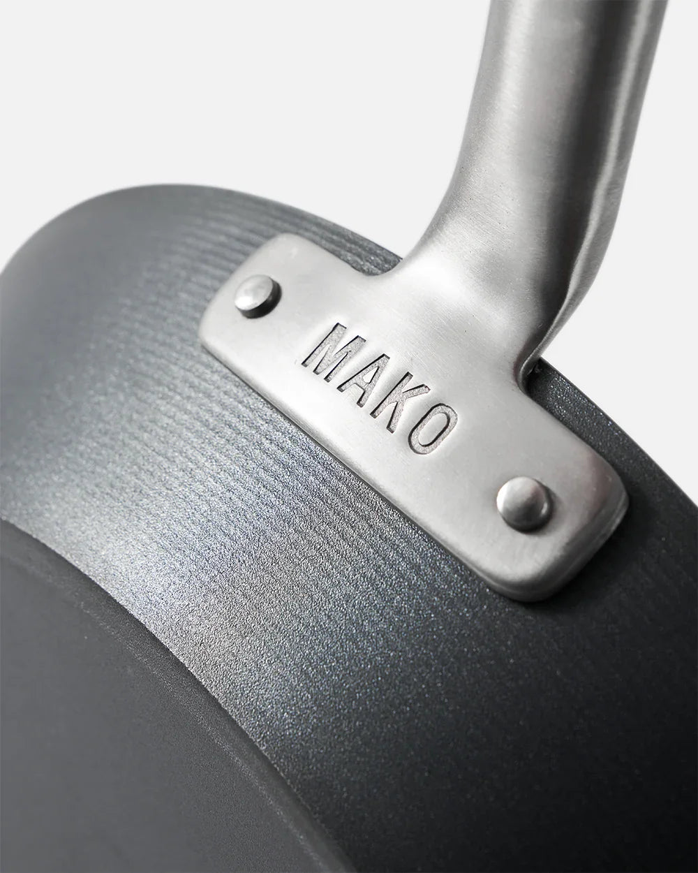 MAKO Black Steel Steak Pan - CookDineHost up close with handle attachment 