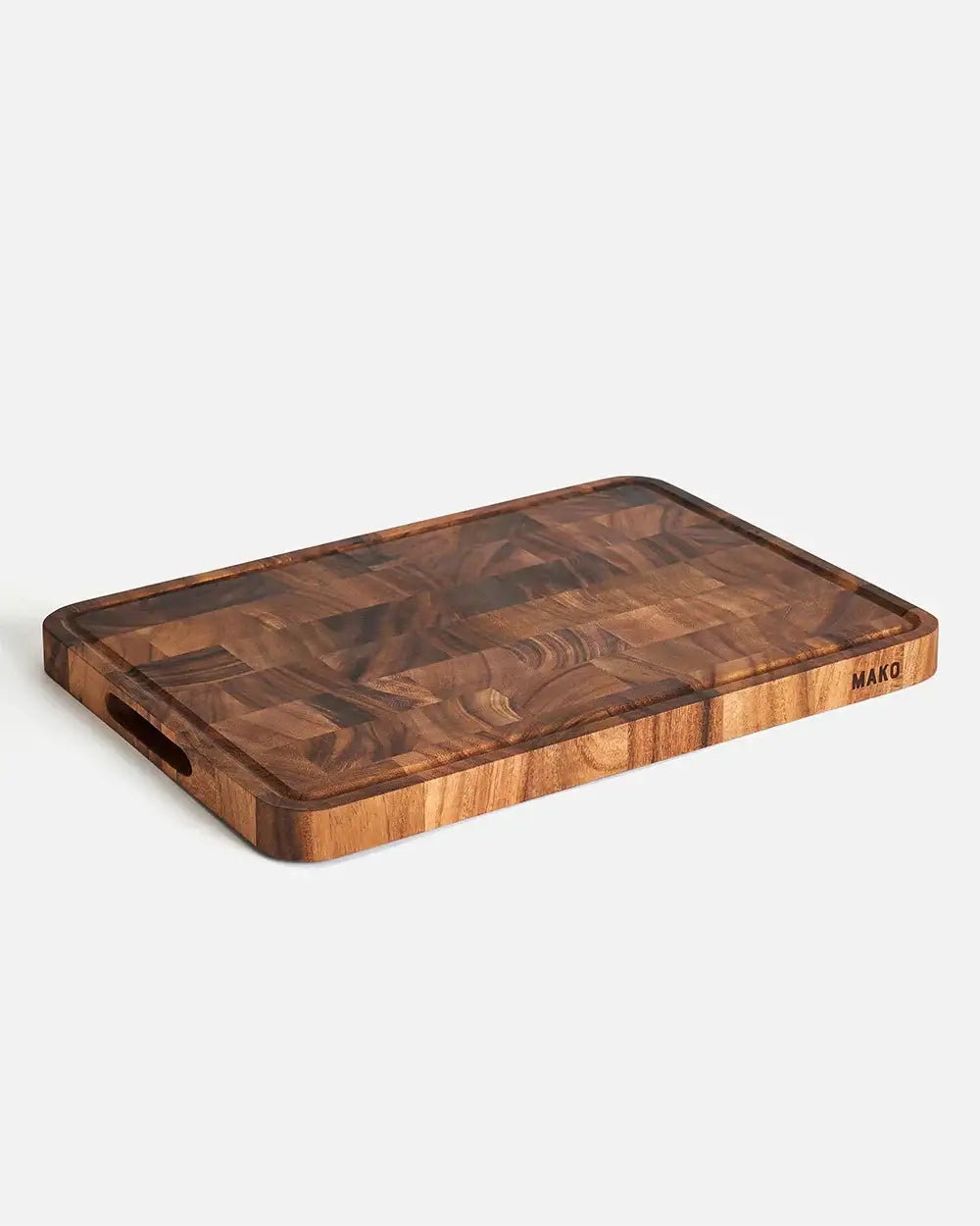 Mako all-purpose wooden chopping board by Marion Grasby with juice groove and side handle slot