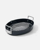 Black oval Mako roasting pan with stainless steel handles and removable grill rack by Marion Grasby