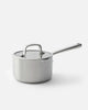 Stainless steel Mako saucepan with lid and long handle on white background by Marion Grasby