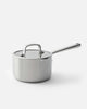 Stainless steel Mako saucepan with lid and long handle on white background by Marion Grasby