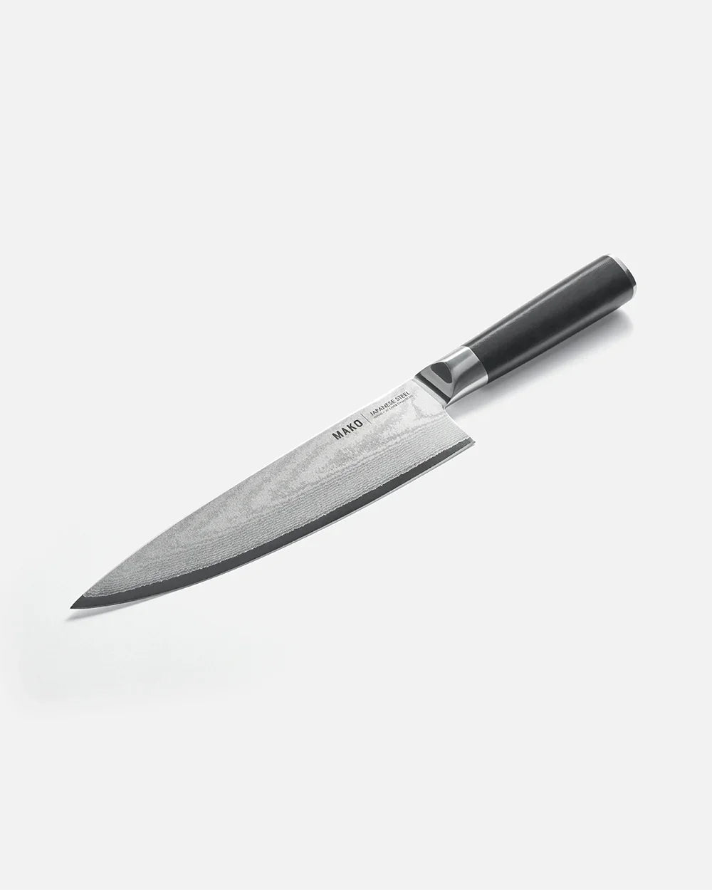 Japanese steel chef knife with black handle on white background