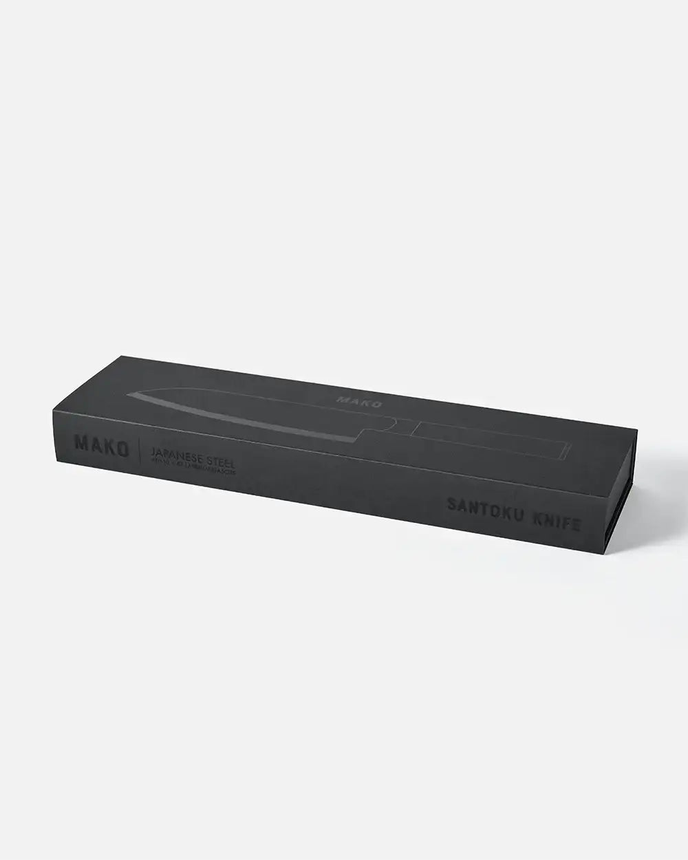 Black rectangular box packaging for Marion Grasby's Mako Japanese steel Santoku kitchen knife